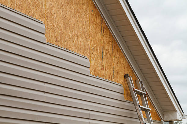 Professional Storm Damage Siding Repair technician working in South Charleston, WV
